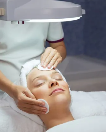 A client during an LED facial skin treatment.